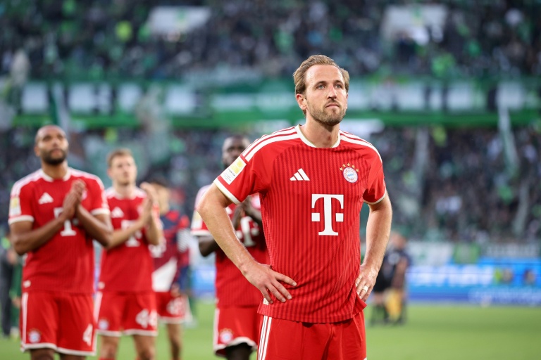 Kane penalty miss as Olise rescues Bayern to pile pressure on Wolfsburg