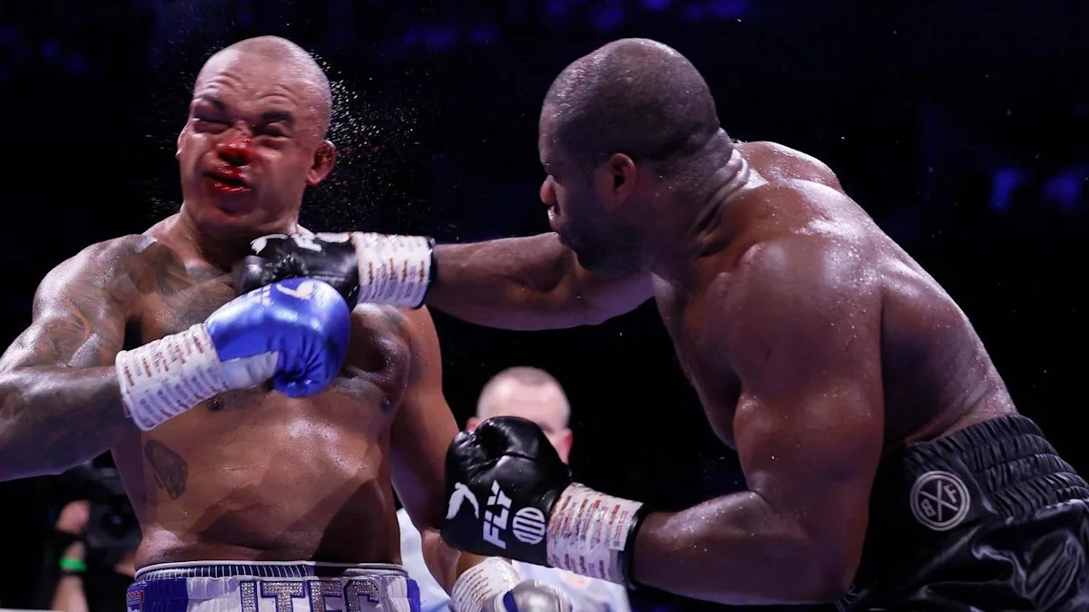 Dubois survives two knockdowns to dethrone Wardley Dubois survives two knockdowns to dethrone Wardley