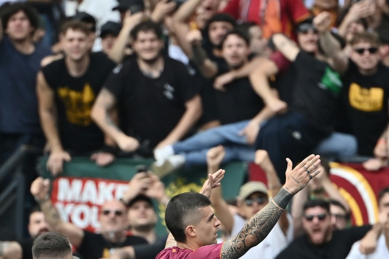 Roma near Champions League return with derby triumph