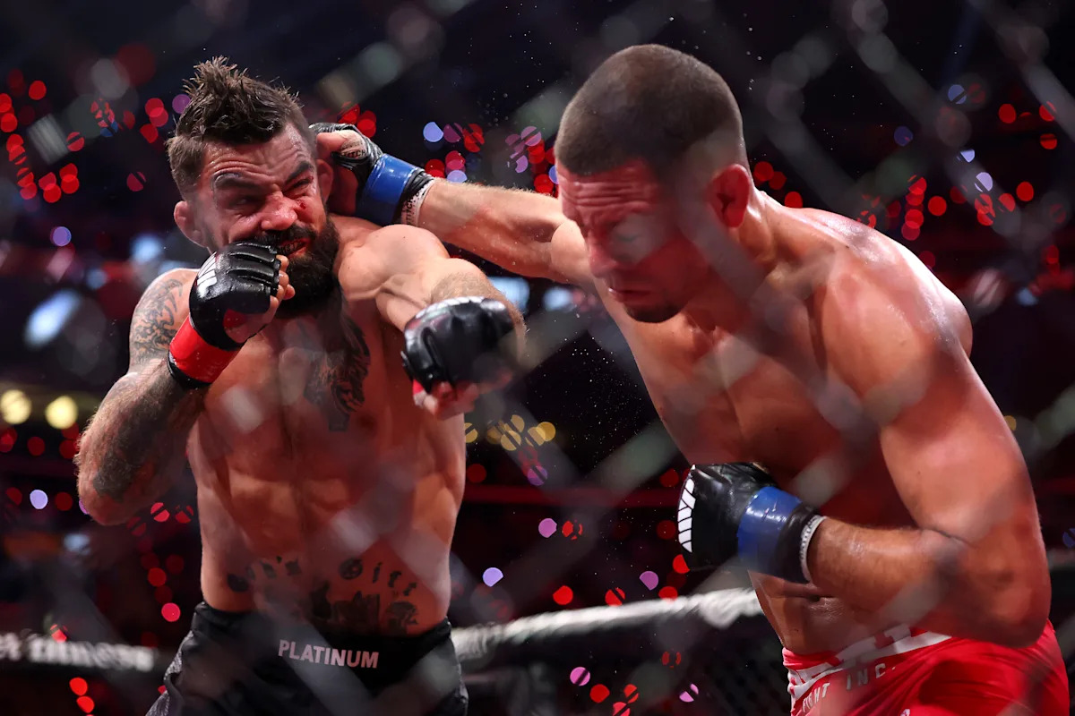Rousey vs. Carano results: Mike Perry dominates Nate Diaz for bloody victory, immediately calls out Jake Paul