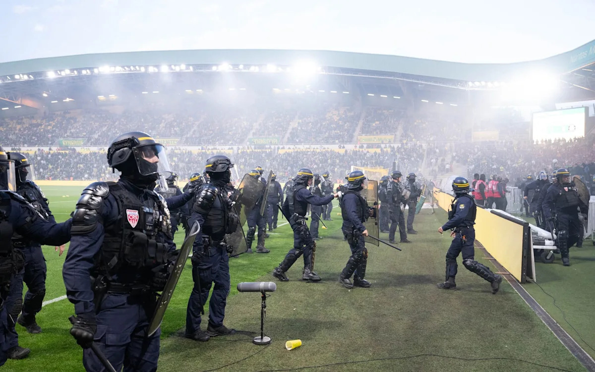 Watch: Ligue 1 match abandoned after ultras storm the pitch